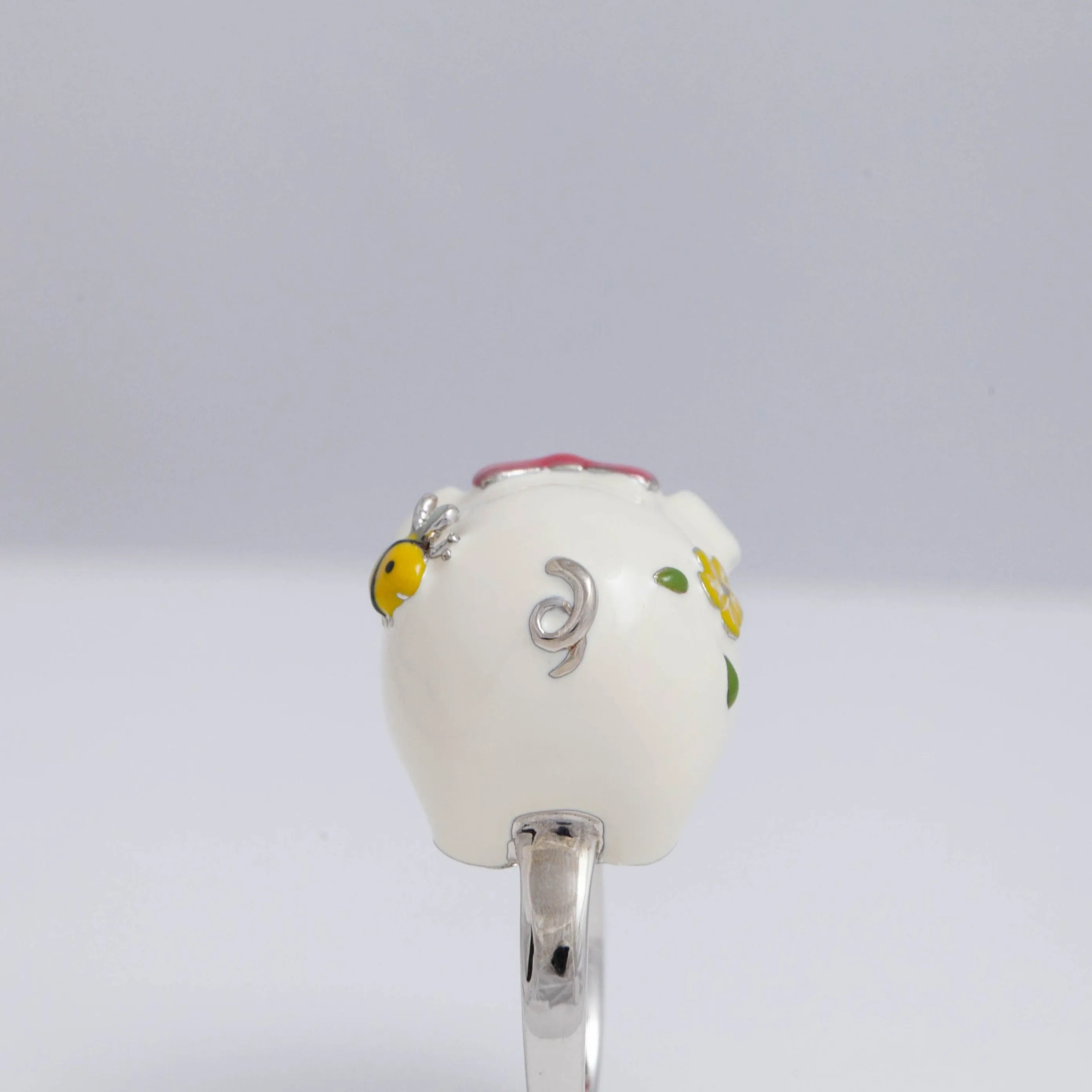 White piggy bank ring